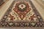 This traditional tribal Ziegler rug is hand-knotted with an all-wool pile on a cotton foundation. This rug is new and in...