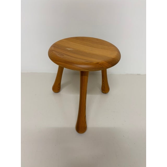 Traditional Scandinavian milking Stool in solid pine, designed by Ingvar Kamprad for Habitat, 1990s. This piece has an...