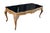 An impressive Early 20th century Italian Baroque Rococo dining table, circa 1920s. Features a serpentine form with reverse...