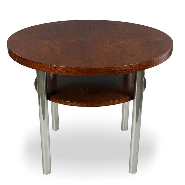 Functionalist side table produced by Kovona, representing classic Czechoslovak interwar design. The combination of a...