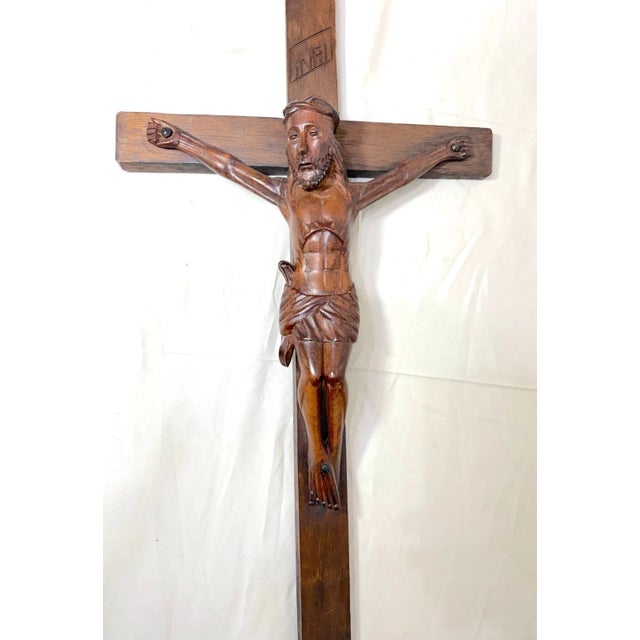 Up for sale is a wonderfully large antique hand carved wooden religious wall crucifix. It's completely carved by hand with...