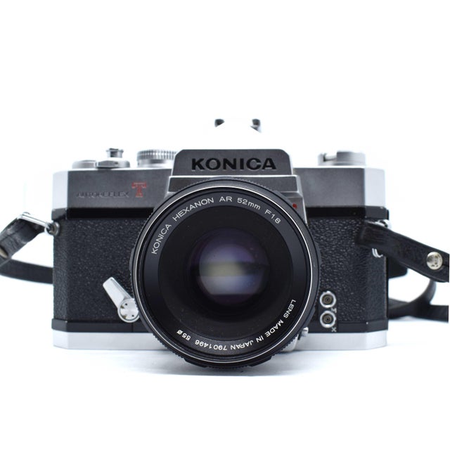 This mid-century Konica Autoreflex T is a masterclass in rugged Japanese engineering and classic analog aesthetics. Known...