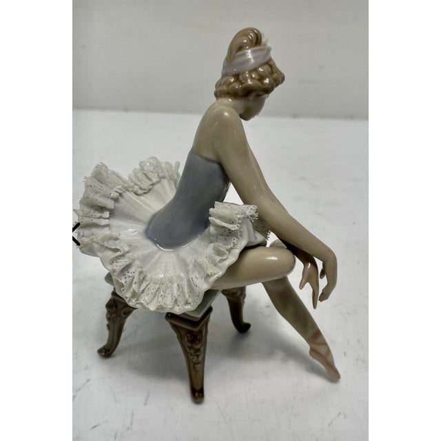 Add a masterpiece of classic elegance to your collection with this exquisite vintage porcelain figurine, officially titled...