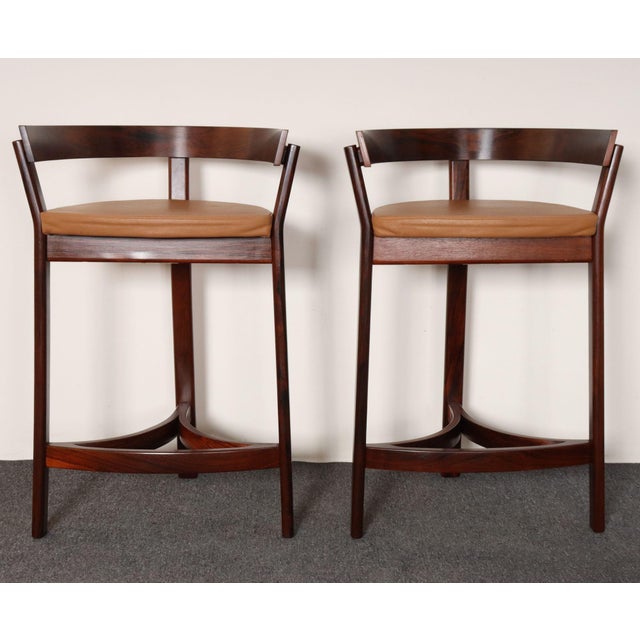 Pair of stylish, comfortable counter stools designed by John Mortensen and produced by Oddense Maskinsnedkeri (ca. 1960s,...