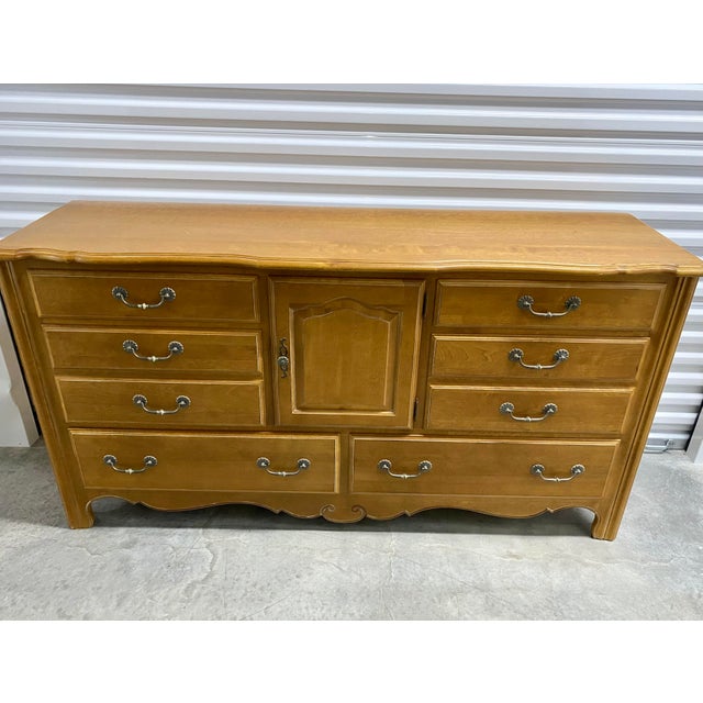 Country French Triple Dresser by Ethan Allen French Provincial Dresser. Width: 68 in, Height: 35 1/4 in, Depth: 19 1/4 in...