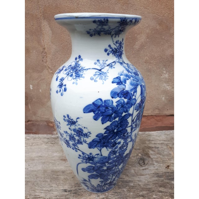 Seto porcelain vase with underglaze blue decoration of birds among flowers. Finely hand painted, signed on the underside....