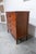 1960s oak chest of drawers with a cherry varnish finish. It is sturdy and beautiful with its wooden handles. Width 92cm...