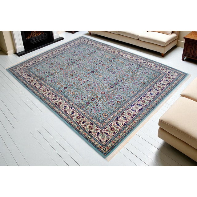 This museum-quality Hereke carpet represents a rare pinnacle of 20th-century Turkish weaving, meticulously hand-knotted in...