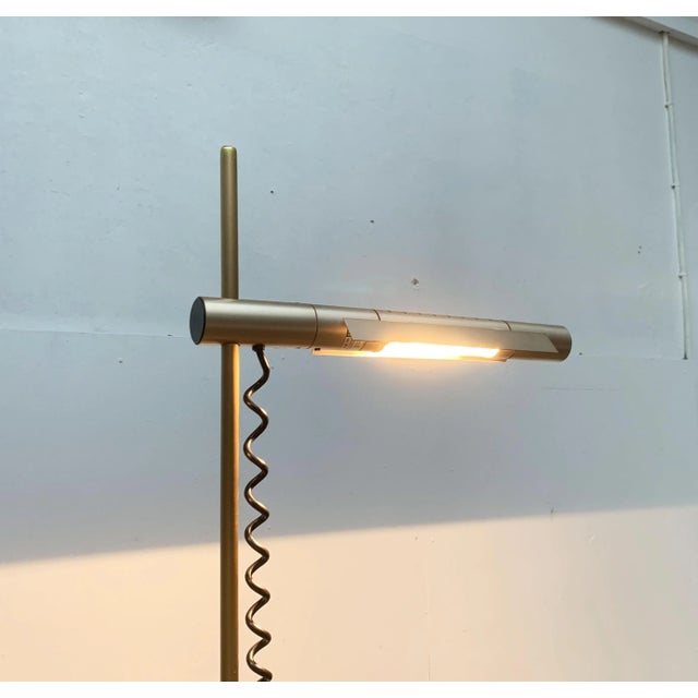 Halo floor lamp by Swisslamps after a design of Rosemarie and Rico Baltensweiler from 1970. Here in a special color. A...