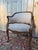 A louis xv style "corbeille" desk chair, 19th century, with a walnut frame and honey-brown patina. cabriole legs, a carved...