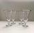 This classic set of vintage water glasses has a tapered shape that is trimmed in silver on a round foot and adds an...