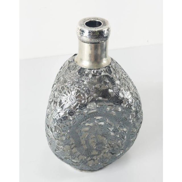 We are selling this cool Chinese Sterling Silver overlay bottle. This glass pinch bottle has overlay decoration with...