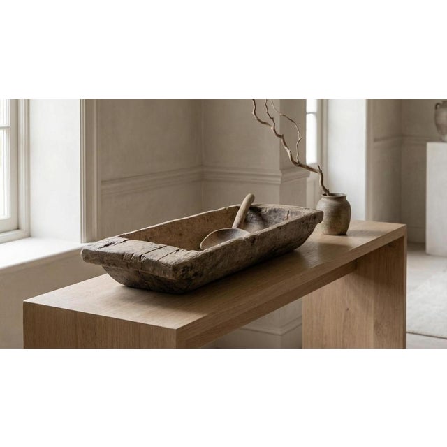 A striking and sculptural antique wooden dough trough, hand-carved in sweden during the late 18th to early 19th century....