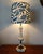 Tapered lamp base in white alabaster with a gilt brass mount. Custom-made Empire-style lampshade in a blue Matisse-style...