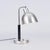 This elegant table lamp dating back to the 1920s was manufactured in Czechoslovakia and represents an exemplary, highly...