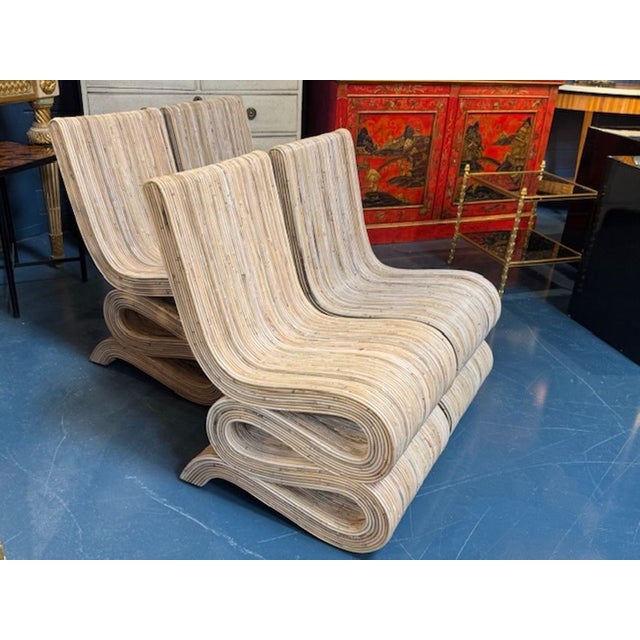 This set of pencil reed rattan chairs. The chairs are made with durable rattan material, making them sturdy and...