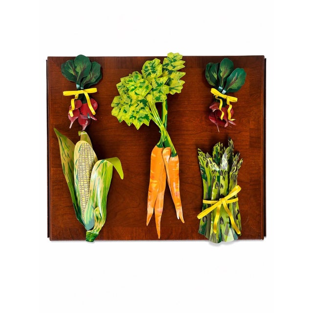 A charming and whimsical collection of five handcrafted layered metal vegetable wall sculptures, each hand-signed and...