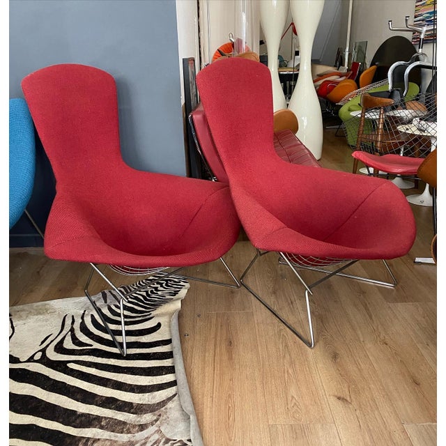 Two Bertoia Bird armchairs in good overall condition. Knoll International edition from the 1970s. Original covers (good...