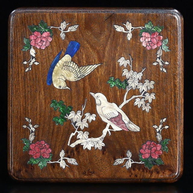 This exquisite vintage wooden box is a beautiful example of traditional craftsmanship. The box is constructed from richly...