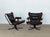 A pair of black leather Falcon lounge chairs by Sigurd Ressell, produced by Vatne Møbler, Norway, 1970s. The defining...