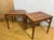 A fantastic and increasingly rare pair of mid century modern teak side tables dating from the 1960s–1970s, offering...