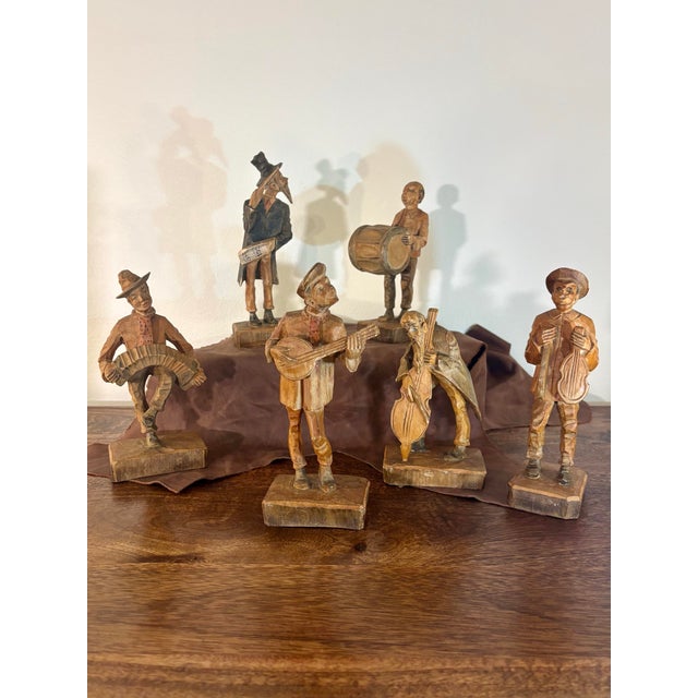 Bring warmth and character to any interior with this charming set of six vintage German folk art musician sculptures. Each...