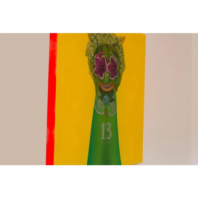 "Vian 13" is one of the pieces from the "Fetishes" series created by Natasha Lelenco in 2022. A suggestion of a face comes...