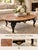 A richly detailed interpretation of classic French Provincial design, this vintage oval coffee table pairs an exceptional...