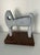 Beautiful Mid-Century Modern marble sculpture in the likeness of a sheep resting on a dark walnut wood base. Created by...