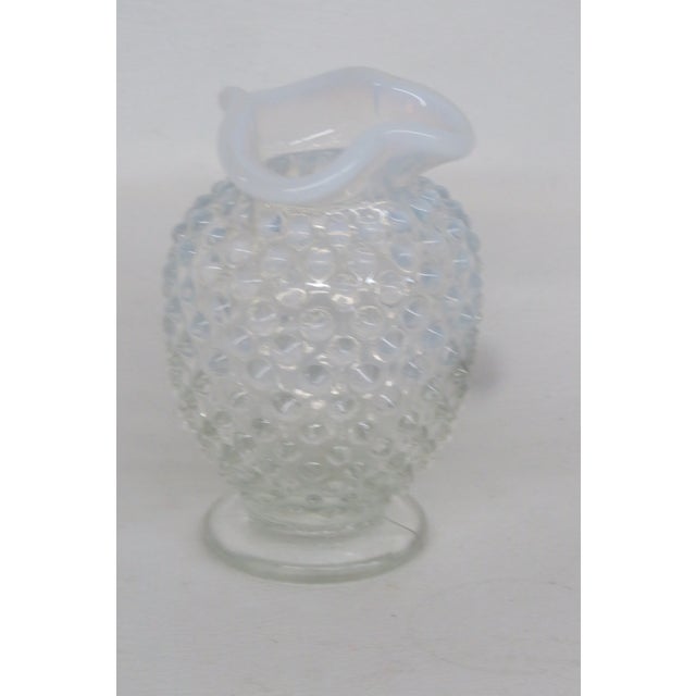 This adorable Small Opalescent Vase is made of art glass and presents a classic vintage French style, a beautiful pleated...