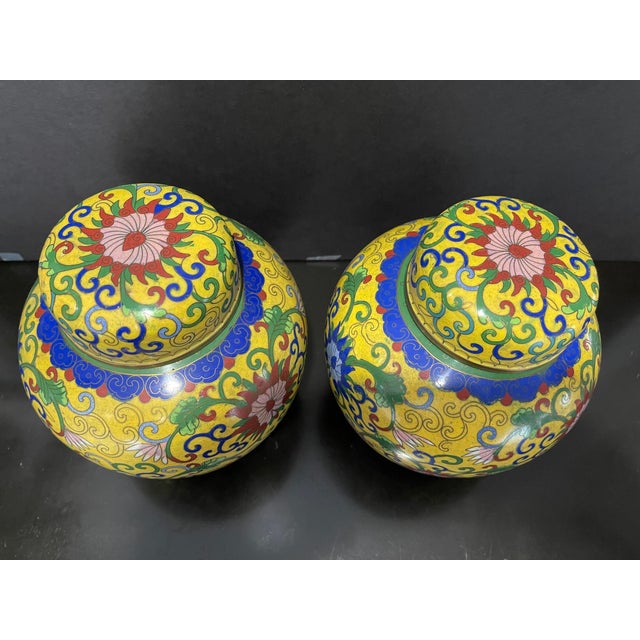 Those antique cloisonné jars with covers are the captivating pieces that showcases the beauty of Chinese craftsmanship....