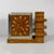Italian Art Deco wooden and metal table clock, 1930s Table clock with rectangular base in wood with metal details. The...