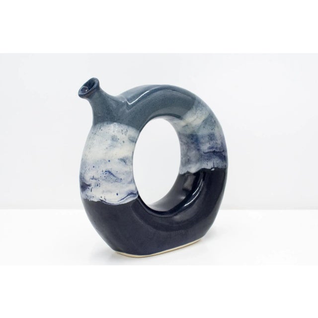 Very cool, vintage (90's) tubular 'donut' shaped pitcher - handmade. Previous owner said she purchased the pitcher over 25...