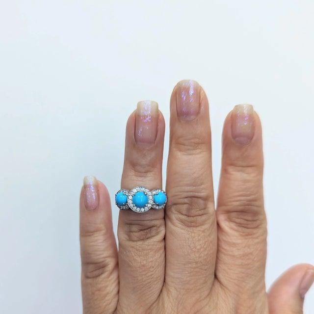 Beautiful turquoise round cabochon and white diamond three stone ring. Handmade in platinum. Ring size 5.75. Metal:...
