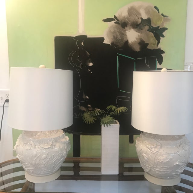 Gorgeous pair of white porcelain Italian lamps with raised flower relief. Original label “Italia Imports hand made in...