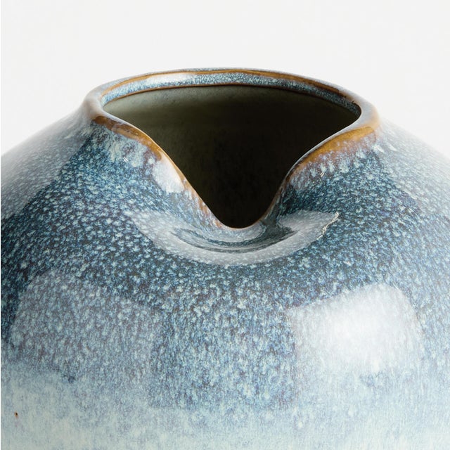 Beautifully sculpted with an indentation at the opening which adds a unique opportunity for a sculptural stem. Finished...