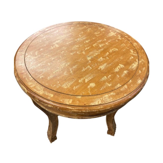 This elegant round side table blends classic European flair with effortless vintage warmth. Designed with Neoclassical and...
