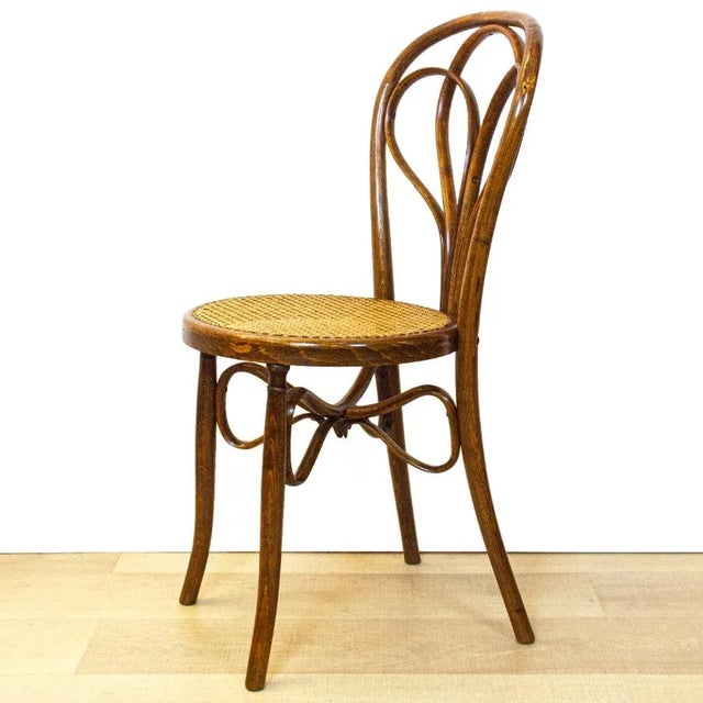 Oak Bentwood chair from the beginning of the 20th century, manufactured by Ventura Feliu, Valencia, Spain. with a woven...