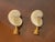 Beautiful mother of pearl turbo sea shells mounted on brass bases lamp finials.