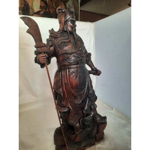 Bring a powerful piece of traditional artistry and cultural history into your home with this striking early-20th-century...