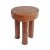 Vintage carved wood round four leg stool from West Africa. Signs of age and use with warm natural finish.