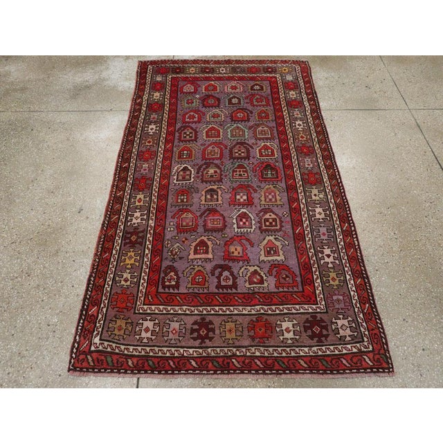 An antique Caucasian Shirvan small accent rug handmade during the early 20th century. Measures: 3' 9" x 6' 7".