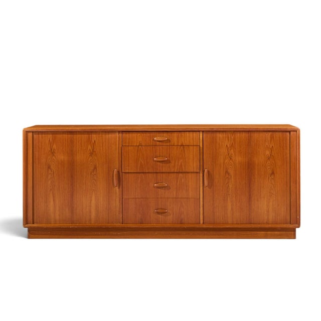 Dyrlund Mid Century Danish Teak Tambour Door Lowboy Dresser This lowboy measures: 76.5 wide x 19 deep x 30.75 inches high...