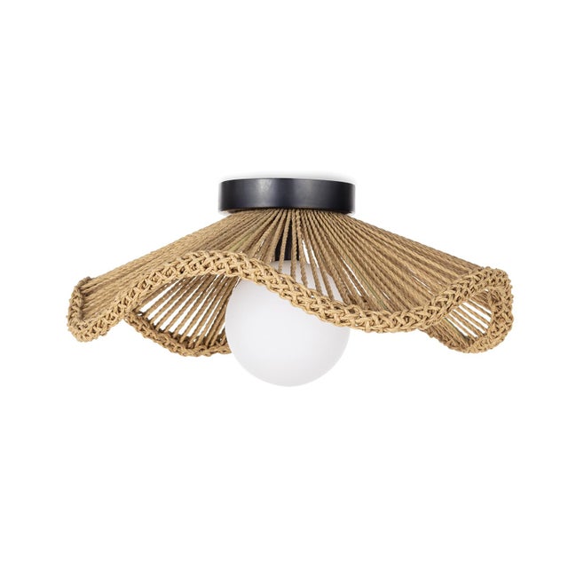 Seaside cafes in the south of France come to mind when the Provence Cafe Pendant adorns a room. A twisted rope shade with...