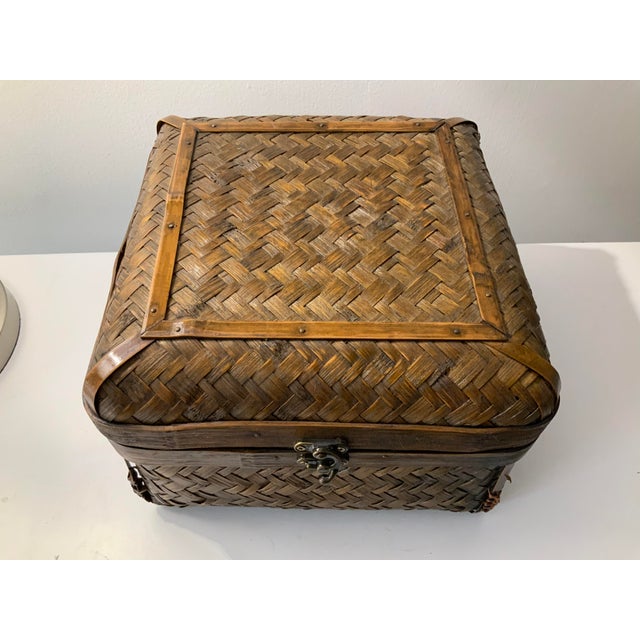 Beautiful vintage woven rattan, bamboo and brass chinoiserie box with latch. This piece is in excellent condition for its...