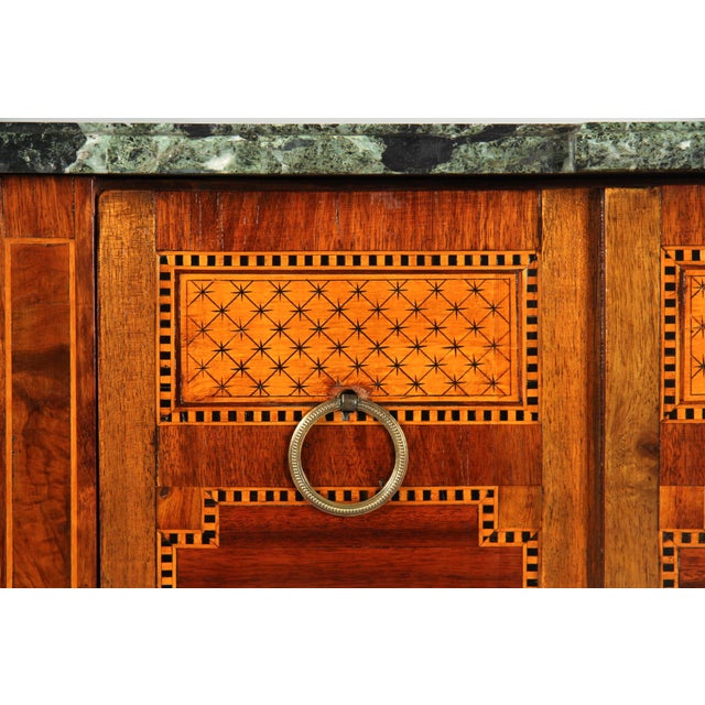 Chest of drawers with marquetry in louis xvi style france marble, exotic woods end of 19th century dimensions: h x w x d:...