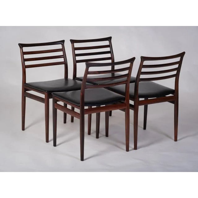 Set of four dining chairs in rosewood designed by Erling Torvits for Sorø Stolefabrik, circa 1960s. Beautiful organic...