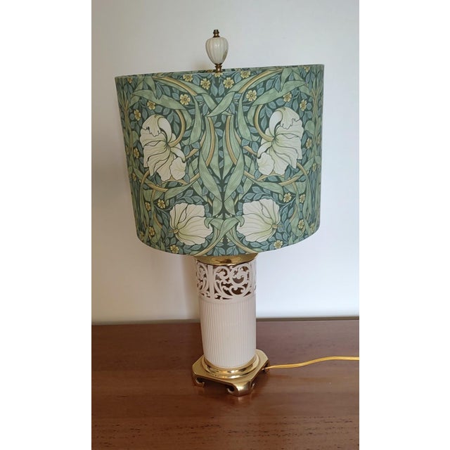 Lenox lamp with original finial and William Morris pimpernel shade. The shade matches the upholstered chair also located...