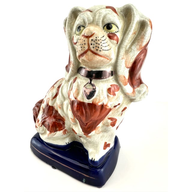 Whether you're a discerning collector or a designer seeking a statement piece, this Vintage King Charles Spaniel adds a...