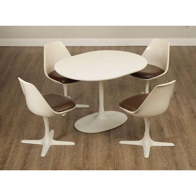 High Quality American Made Vintage Laminate Oval Dining Table and Four Chairs with Vinyl Upholstered Seats, By Burke in...